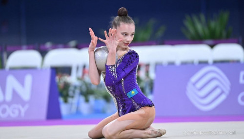 Көркем гимнастикадан қоржынға тоғыз алтын түсті